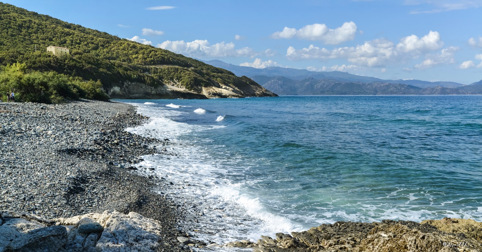 Foto av Farinole beach II med stenar yta