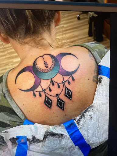 Explore melanie martinez tattoos ideas, creative tattoo ideas in Homer, available at Mostly Harmless Tattoo Studio