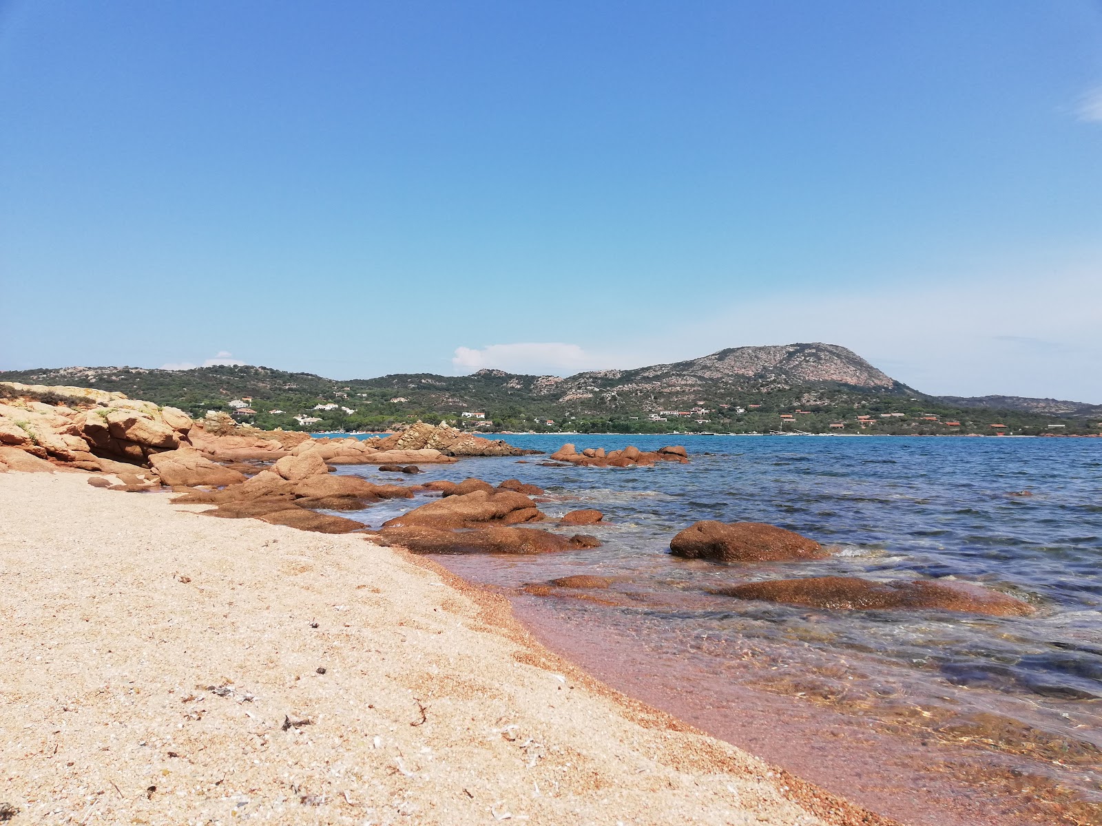 Foto de Spiaggia del Cuore com areia marrom superfície
