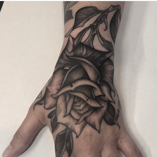 Explore checkered flag tattoo ideas, creative tattoo ideas in Spokane, available at Anchored Art Tattoo