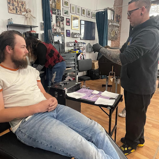 Explore dad son tattoo ideas, creative tattoo ideas in Belgrade, available at The Loyal Sparrow Tattoo and Piercing