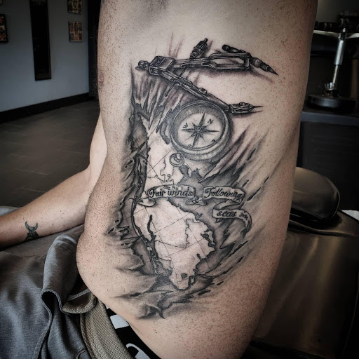 Explore tattoo for men ideas, creative tattoo ideas in Palm Harbor, available at Angry Owl Tattoo and Piercing