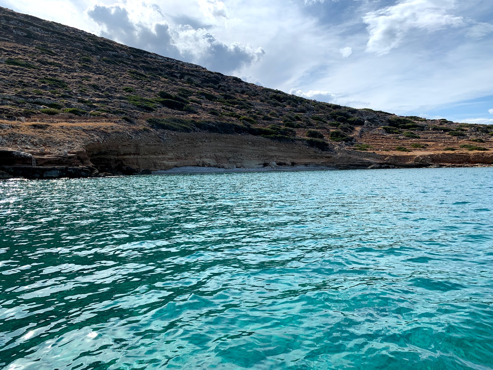 Photo of Kary Bay with turquoise pure water surface