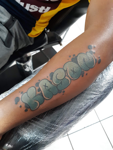 Explore we the people tattoo ideas, creative tattoo ideas in Eunice, available at Supreme Ink Tattoo & Piercing