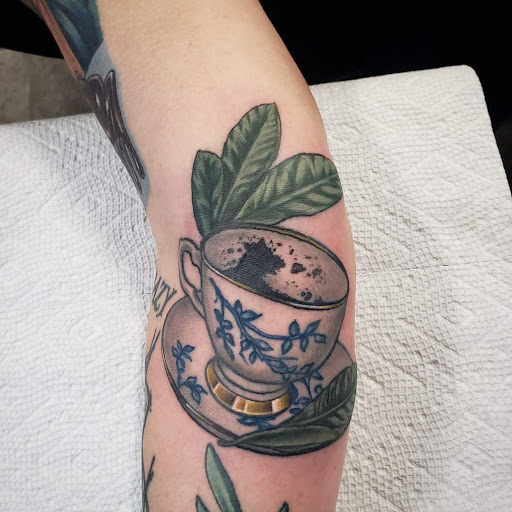 Explore dirt bike tattoo ideas, creative tattoo ideas in Burlington, available at Lost Boys Tattoo & Piercing