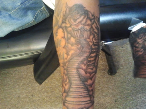 Explore tattoo ideas for men chest, creative tattoo ideas in Whitehall, available at Beachside Tattoos & Smoke Shop