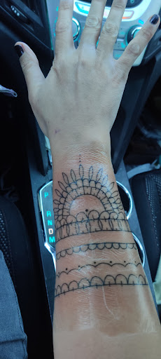 Explore half sleeve memorial tattoo ideas, creative tattoo ideas in Oshkosh, available at Oshkosh Tattoo & Good Girl