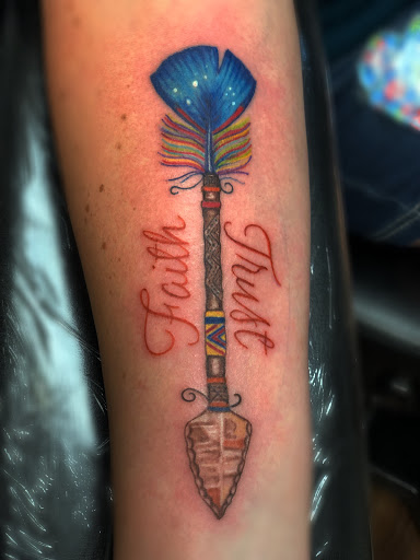Explore ripped skin tattoo ideas, creative tattoo ideas in Amarillo, available at Tattoo Spa LLC