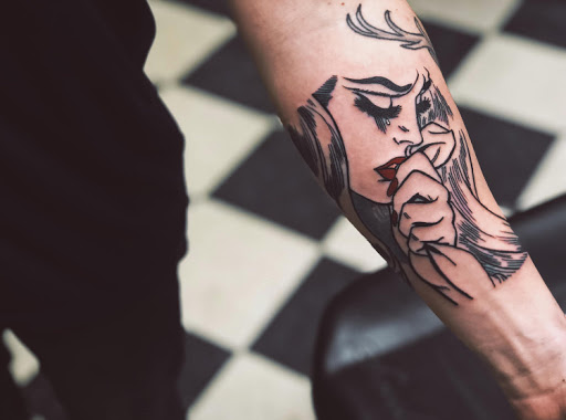 Explore nike tattoo ideas, creative tattoo ideas in Stevens Point, available at Black Rabbit Tattooing