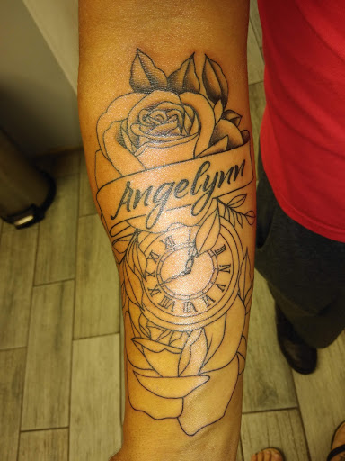 Explore olive branch tattoo ideas, creative tattoo ideas in Auburndale, available at Soldiers Of Ink
