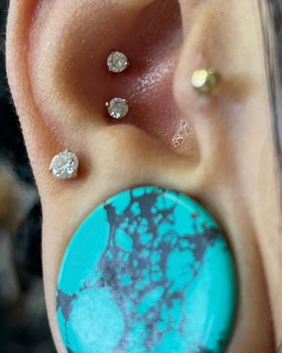 Explore floral tattoo sleeve ideas, creative tattoo ideas in Bakersfield, available at Vixen Body Piercing