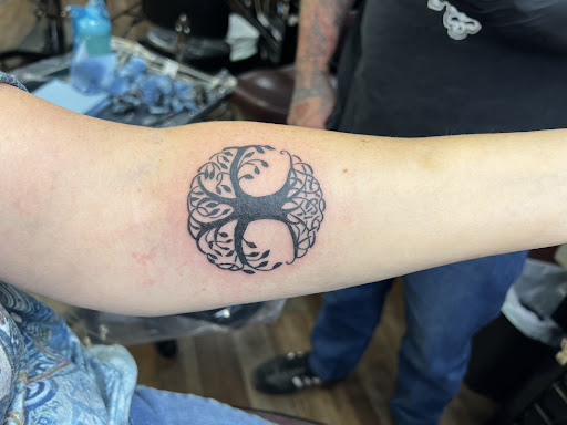 Explore reggae tattoo ideas, creative tattoo ideas in Clarksville, available at Dark Raine Tattoo