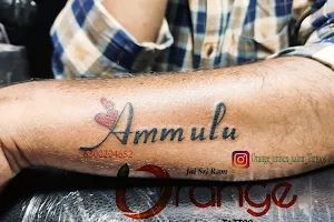 Orange unisex salon & Tattoo image