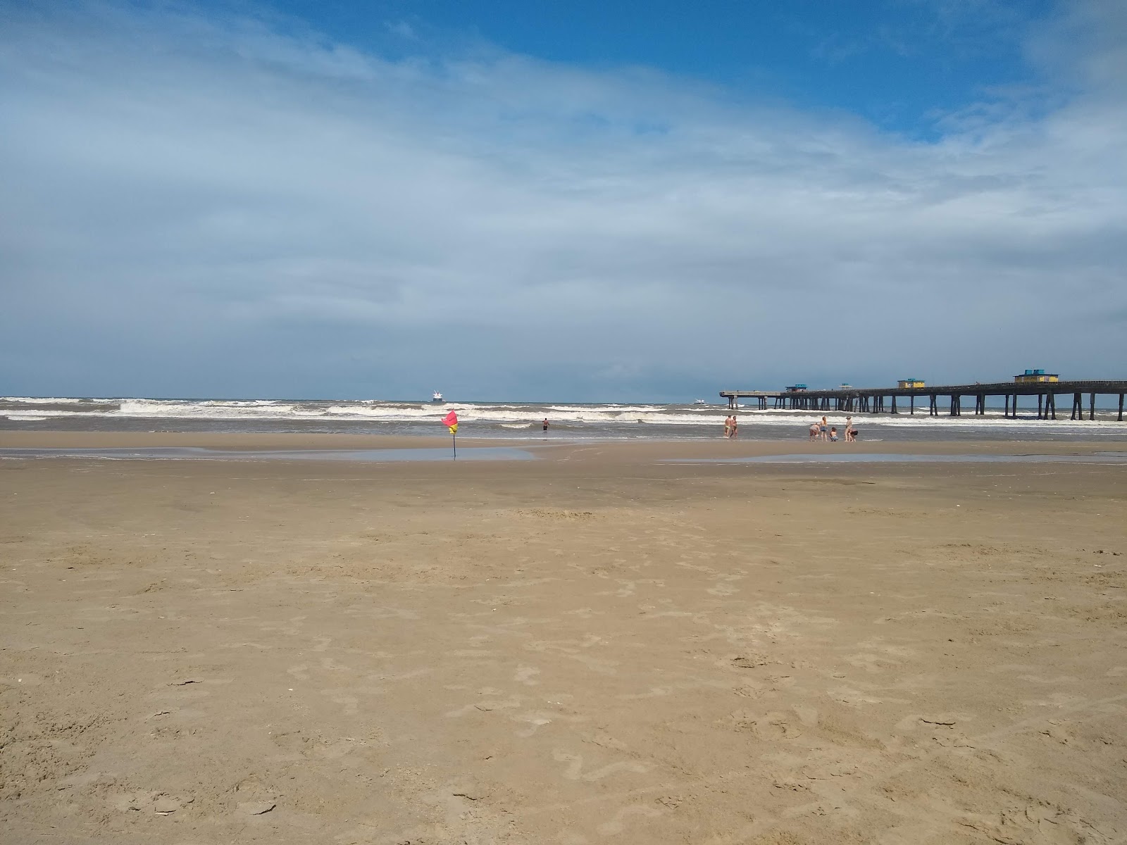 Foto von Praia de Tramandai mit langer gerader strand