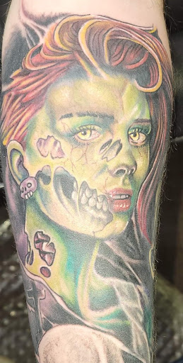 Explore tattoo half sleeve ideas, creative tattoo ideas in Angola, available at Hoodlum Ink