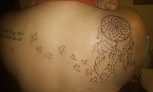 Tattoo Shop «Ink Slingers», reviews and photos, 1355 E Kearney St, Springfield, MO 65803, USA