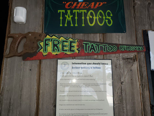 Explore tattoo logo design ideas, creative tattoo ideas in Monticello, available at Its Just A Flesh Wound