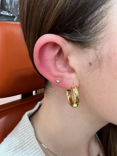 Explore stomach tattoo ideas for females, creative tattoo ideas in South Jordan, available at Groovy Peach Piercing Co