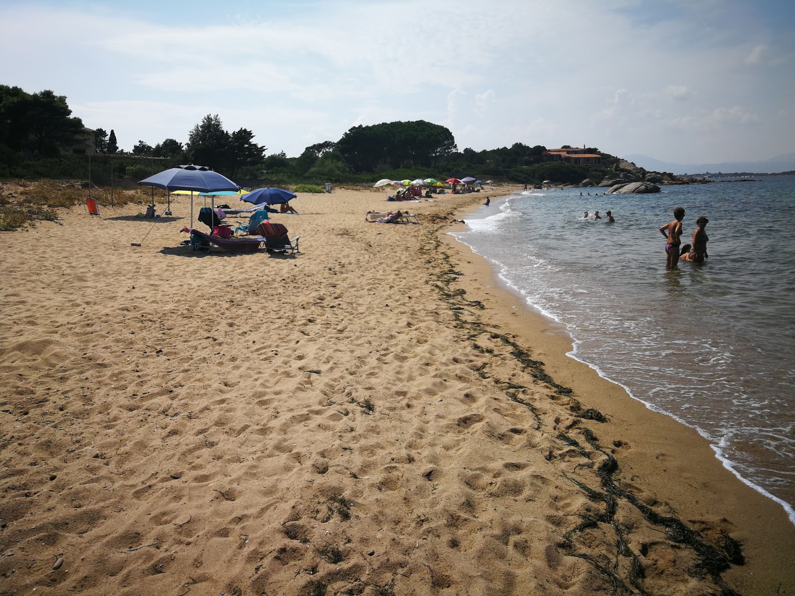 Foto van Spiaggia Su Sarrale II met turquoise puur water oppervlakte