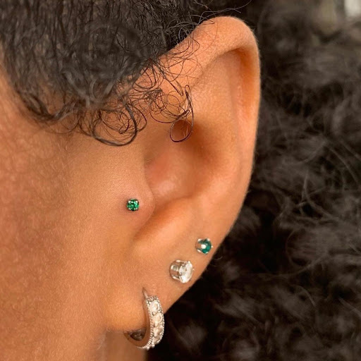 Explore tiny tattoo ideas with meaning, creative tattoo ideas in Aurora, available at Bespoke Piercing & Jewelry (Inside Bonaroo Tattoo)