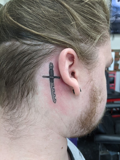 Explore mom tattoo ideas for son, creative tattoo ideas in Slippery Rock, available at Dinky Dachshund Tattoo Parlor