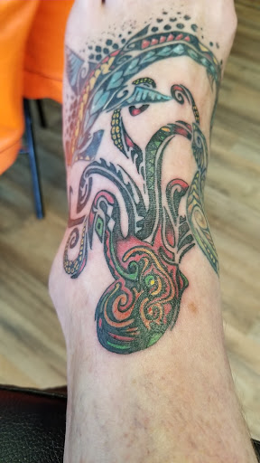 Explore lion and the lamb tattoo ideas, creative tattoo ideas in Muncie, available at Abandon all hope tattoo and body piercing