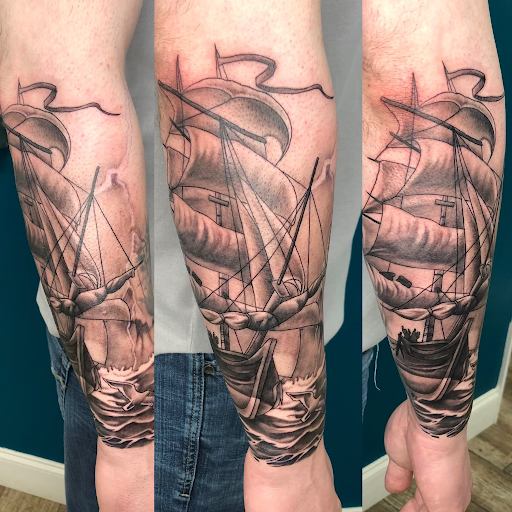 Explore name cover up tattoo ideas for men, creative tattoo ideas in Buford, available at Wild Tribe Tattoos and Piercings