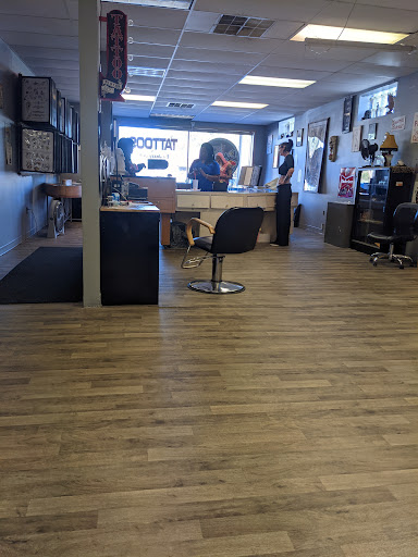 Tattoo Shop «Fat Cats Tattoos», reviews and photos, 111 State Rd NW, Warren, OH 44483, USA