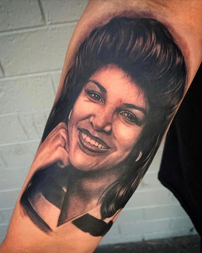 Explore bite me tattoo ideas, creative tattoo ideas in Glendale, available at Knucklehead Tattoo Shop