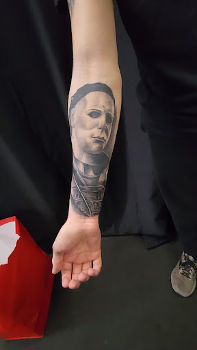 Explore cherry blossom tree tattoo ideas, creative tattoo ideas in Lakewood, available at Aces and Eights Tattoo