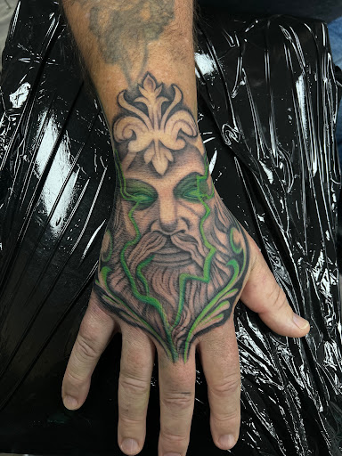 Explore knuckle tattoo ideas for men, creative tattoo ideas in Steubenville, available at Garloch Tattooing