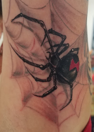 Explore 2001 tattoo ideas, creative tattoo ideas in Fort Mohave, available at RedRum Tattoo & Body Piercing Co.