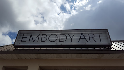 Explore cover up tattoo ideas for upper arm, creative tattoo ideas in Tifton, available at Embody Art Tattoo Studio