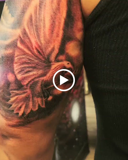 Explore submissive tattoo ideas, creative tattoo ideas in Las Vegas, available at Work of Art Tattoo and Piercing