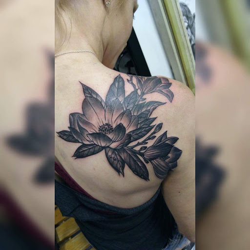 Explore gamble tattoo ideas, creative tattoo ideas in Asheville, available at Aacross The Skin Tattoo Shop