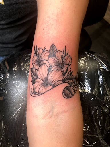 Explore tattoo ideas on forearm, creative tattoo ideas in Englewood, available at Point of Entry Tattoo
