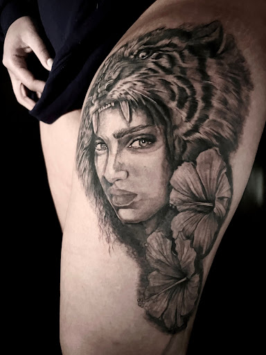 Explore cheetah print tattoos ideas, creative tattoo ideas in Bronx, available at Brass Knuckles Ink Tattoo Studio