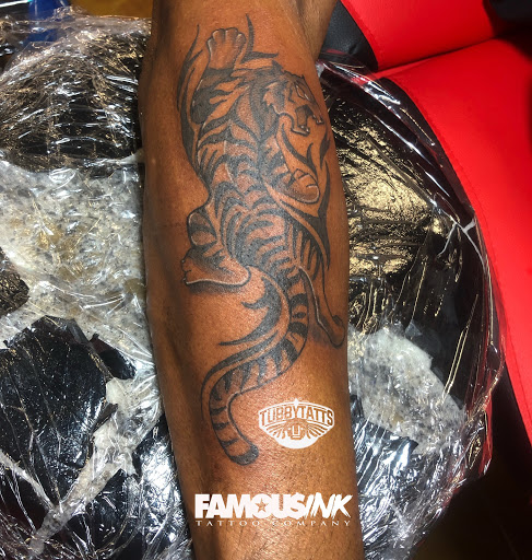 Explore family portrait tattoo ideas, creative tattoo ideas in Hammond, available at Famous Ink, Inc.