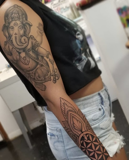 Explore emerald tattoo ideas, creative tattoo ideas in Sioux City, available at Living Art Tattoo Studio