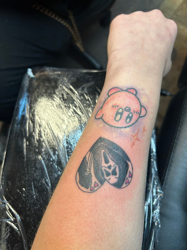 Explore snake sleeve tattoo ideas, creative tattoo ideas in Blackwell, available at Crimson Owl Tattoo