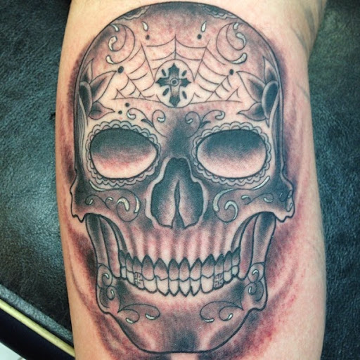 Explore dog memorial tattoo ideas, creative tattoo ideas in Honolulu, available at Sacred Art Tattoo Waikiki