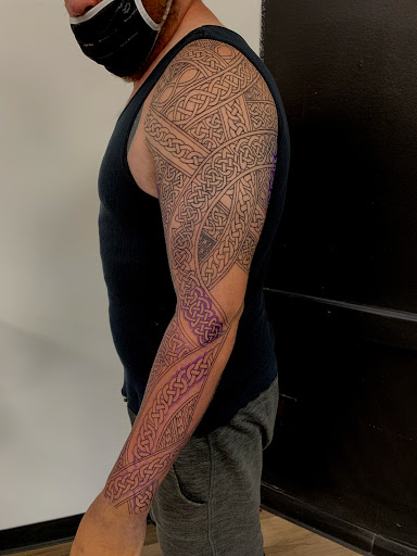 Explore unique side thigh tattoo ideas, creative tattoo ideas in Mount Clemens, available at Hand & Heart Tattoo