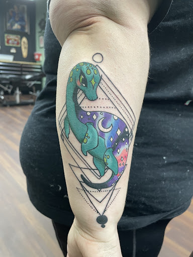 Find tattoo ideas for upper arm men for your next unique tattoo in Columbus at Evolved Body Art