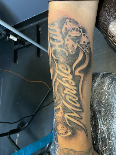 Tattoo Shop «Tuff City Tattoos», reviews and photos, 650 E Fordham Rd, Bronx, NY 10458, USA