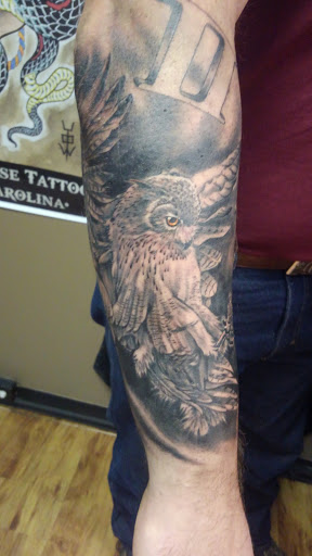 Explore chest tattoo ideas for females, creative tattoo ideas in Asheboro, available at Cardinal Rose Tattoo Gallery