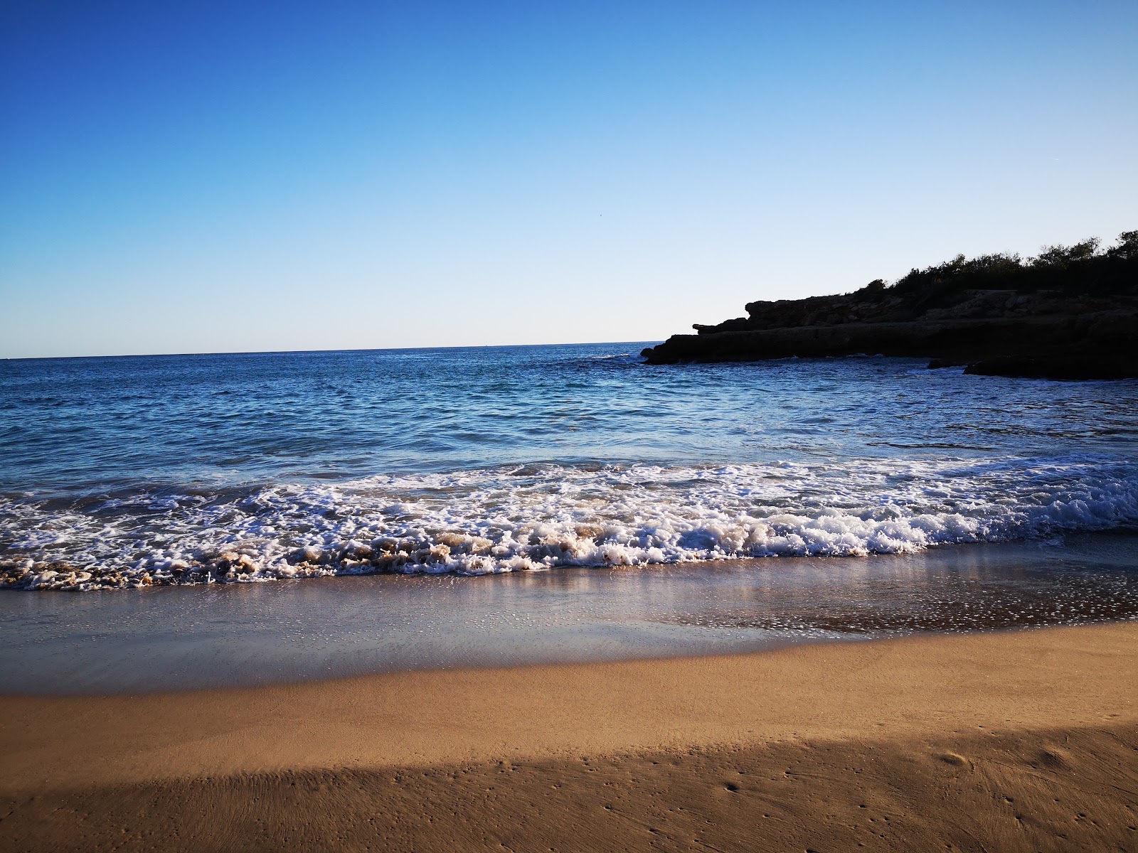 Foto av Cala del vidre med hög nivå av renlighet