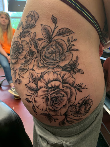 Explore black heart heart tattoo cover up ideas, creative tattoo ideas in Charlottesville, available at Mystic Tattoo and Body Piercing