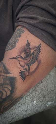 Explore cross stitch tattoo ideas, creative tattoo ideas in Garden Grove, available at Dr. Tattoo Studio