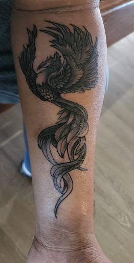 Explore chest piece tattoo ideas for men, creative tattoo ideas in Pearl City, available at Banzai Tattoo