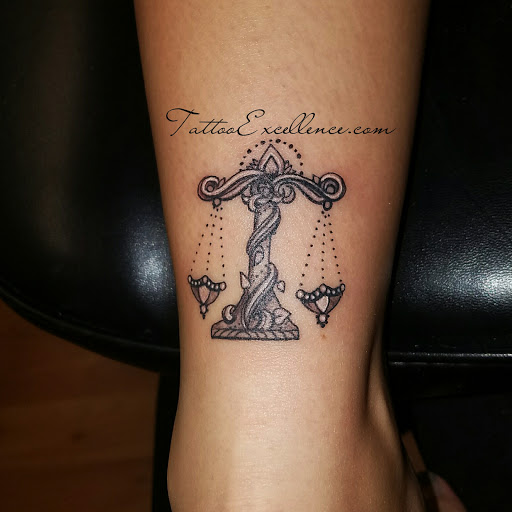 Tattoo Shop «Tattoo Excellence», reviews and photos, 227 S Main St, Milltown, NJ 08850, USA